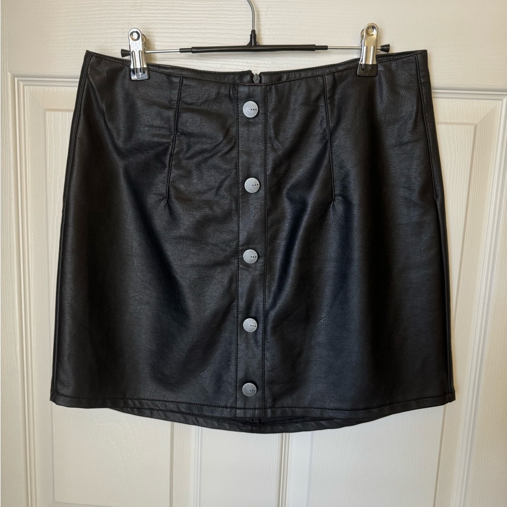 Black, faux leather mini skirt with button details